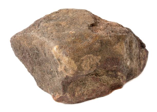 istock A stone on a white background. A piece of red granite 1730941821