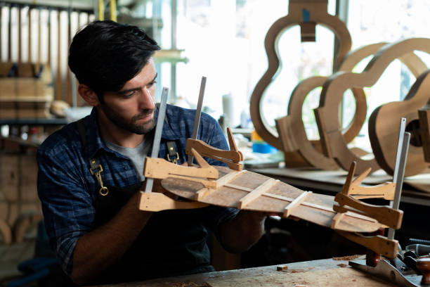 istock Guitar Bracing Inspection by Luthier 1730962651
