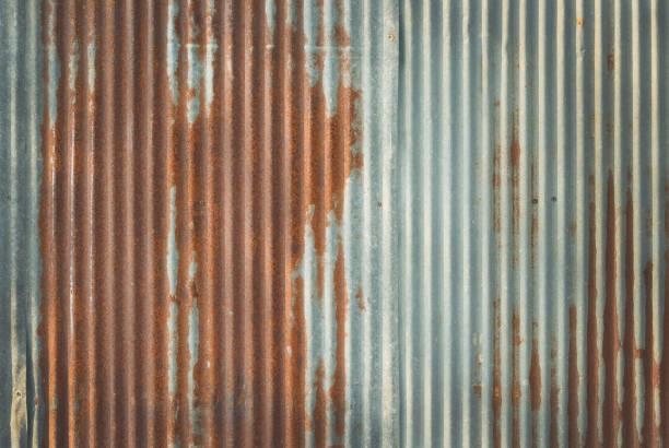 istock Old zinc wall texture background, rusty on galvanized metal panel sheeting. 1730972893