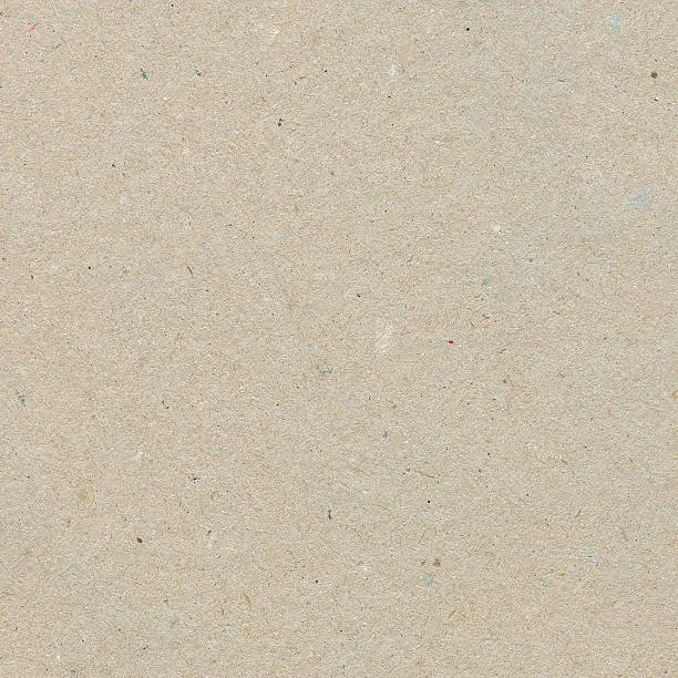 Photo of Beige recycled paper with texture grains