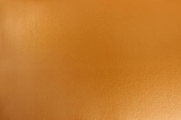 istock Gold background with cardboard texture and gradient. A graphic resource for designers. 1731045324