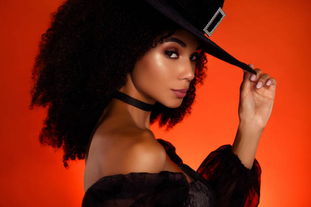 istock Photo of powerful dangerous evil witch look devil touch hat prepare for demon spell over hell color background 1731083300
