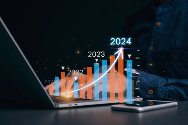 istock Positive indicators in 2024. Planning and strategy, business development concept.Businessman analyzes profitability of working companies with digital augmented reality graphics 1731084034