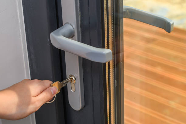 istock Insert the key into the lock on the balcony door at home 1731088320