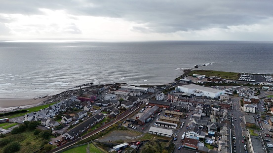 Stunning aerial view of Ardrossan, Scotland, a coastal city full of life and activity