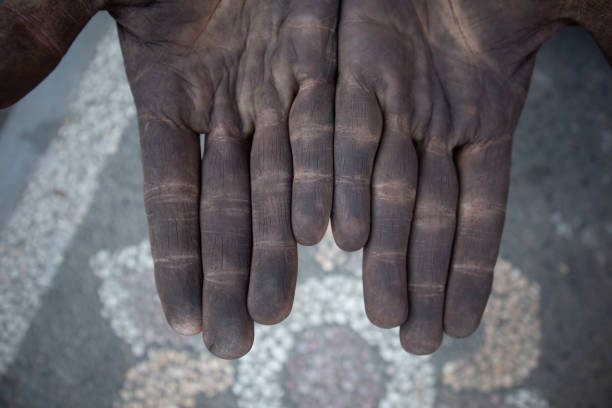 istock Dirty hands of a man 1731095841