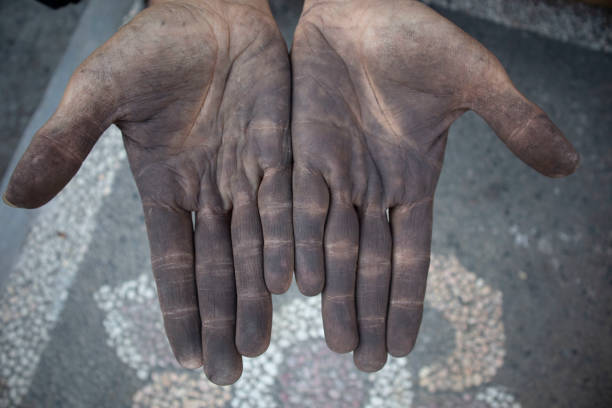 istock Dirty hands of a man 1731095847
