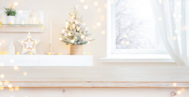 istock Glittering Christmas holiday background with empty wooden table in front 1731095859