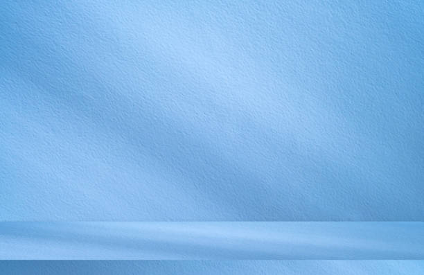 istock Backgrounds and backdrops inside empty studios and product displays in shiny blue. on a background suitable for blank text and product showcases. 1731104218