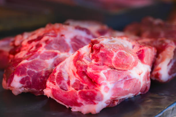 istock Fresh pork on the market stall 1731112440