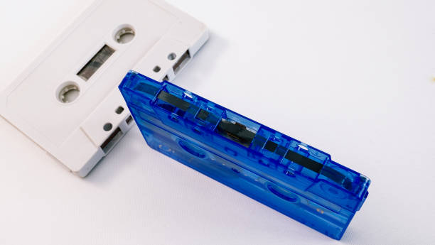 istock Blue cassette tapes from the 90s on white background.2 1731122783