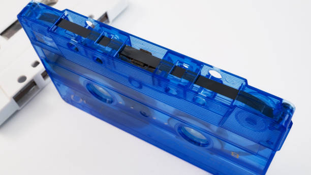 istock Blue cassette tapes from the 90s on white background.1 1731122921