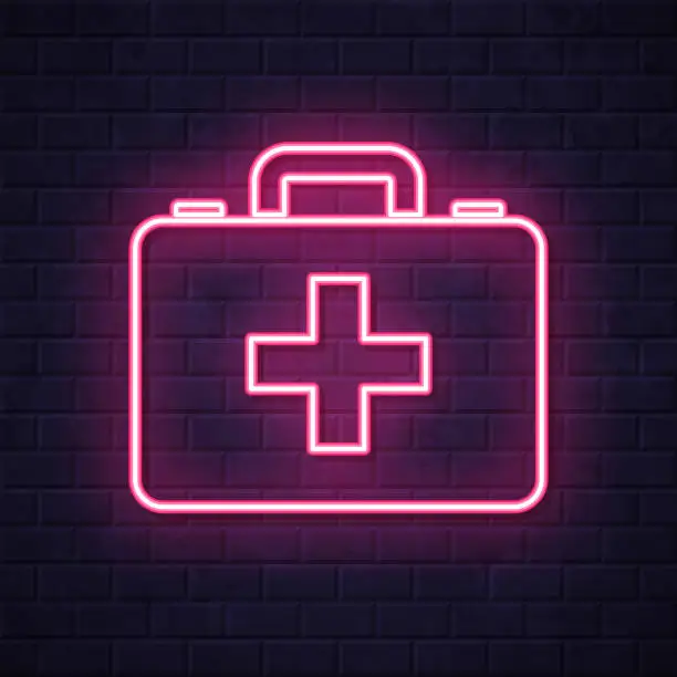 Vector illustration of Medical case - First aid kit. Glowing neon icon on brick wall background