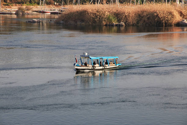 Egypt,  Luxor - March 01, 2019: boats for walks with tourists on the Nile, Karnak, Luxor, Egypt