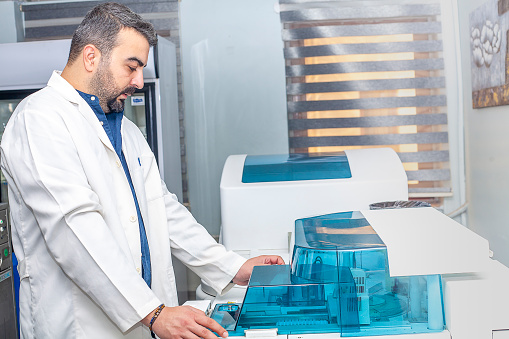 Lab Assistant Conducting Tests