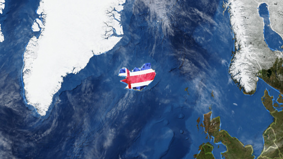 Credit: https://www.nasa.gov/topics/earth/images\n\nAn illustrative stock image showcasing the distinctive tricolor flag of Iceland beautifully draped across a detailed map of the country, symbolizing the rich history and culture