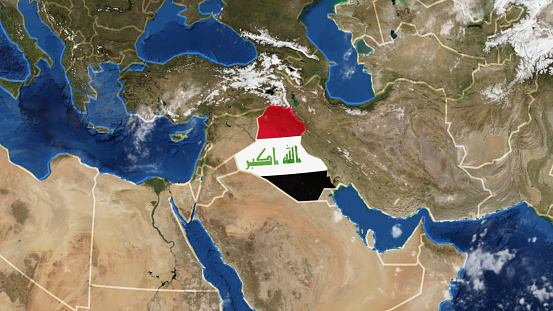 Credit: https://www.nasa.gov/topics/earth/images\n\nAn illustrative stock image showcasing the distinctive tricolor flag of Iraq beautifully draped across a detailed map of the country, symbolizing the rich history and culture