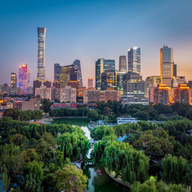 The skyline of Beijing at sunset, beautiful and fresh urban environment, and green vegetation.