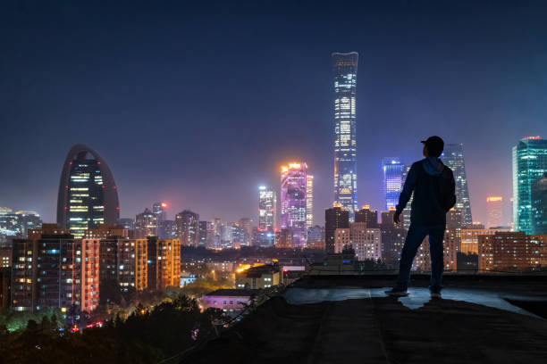 istock The silhouette portrait at night in beijing cbd 1731175439