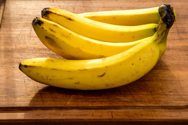 istock ripe bananas on a kitchen plank 1731185876
