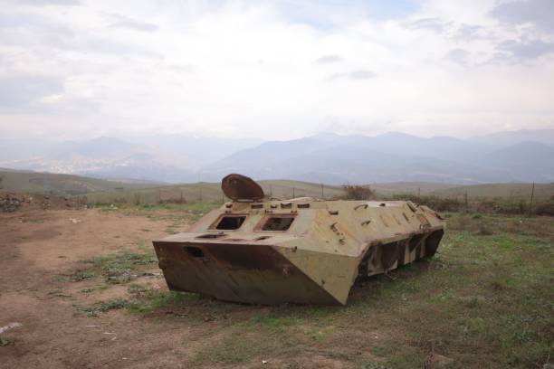 istock the rusty old tank is in a field by the mountains 1731188635