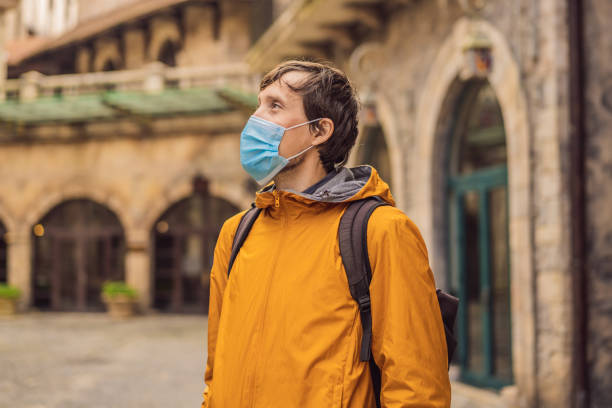 istock Tourist in protective mask 1731202735