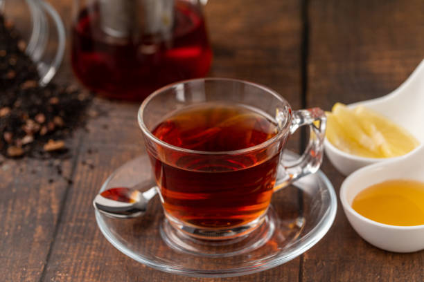 istock Freshly brewed turkish tea in glass cup on wooden table 1731203909