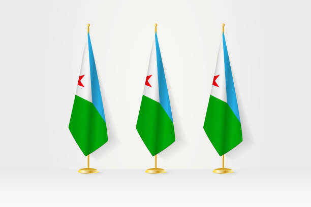 Three Djibouti flags in a row on a golden stand, illustration of press conference and other meetings. Three Djibouti flags in a row on a golden stand, illustration of press conference and other meetings. Vector illustration. flag of djibouti stock illustrations