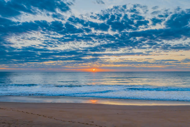 Aerial Sunrise at Palm Beach on the Northern Beaches of Sydney, NSW, Australia.
