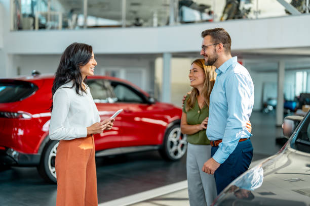 istock Happy young couple purchasing new car. 1731247251