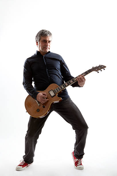 Adult man playing guitar