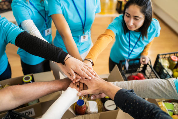 istock High angle view of multiracial friends stacking their hands 1731259734