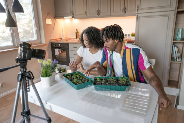 istock Green-fingered gardeners vlogging about their seedlings 1731262059