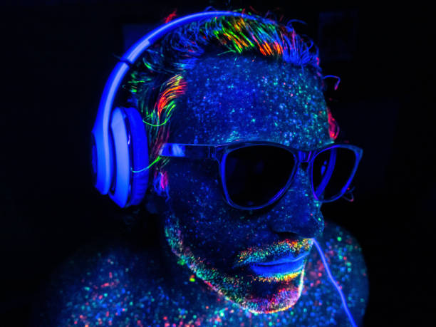 istock A DJ with headphones under UV lights 1731264375