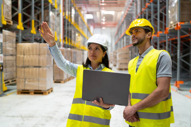 istock A female engineer talking to a warehouse worker 1731264444