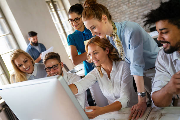 istock Group of business people and software developers working as a team in office 1731265070