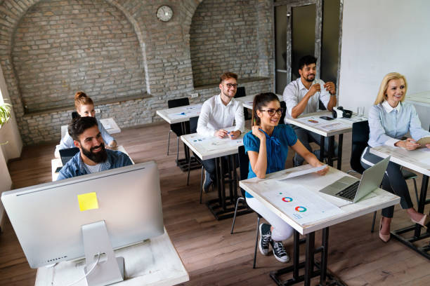 istock Group of multinational business people develop themselves in business training, meeting in office 1731270163