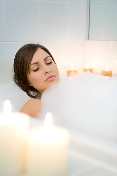 istock Beauty Relaxing In Her Bathtub 173127789