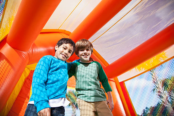 istock Boys in bounce house 173127832