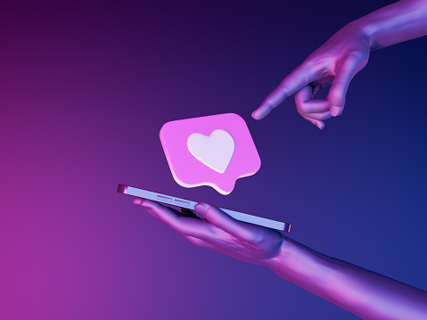 heart symbol on a mobile phone held by one hand and another hand pointing at it on a futuristic neon background. 3d rendering