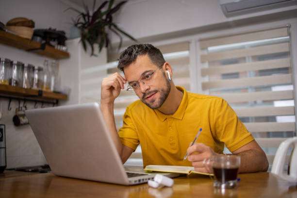 istock Young businessman is working on a laptop 1731330653