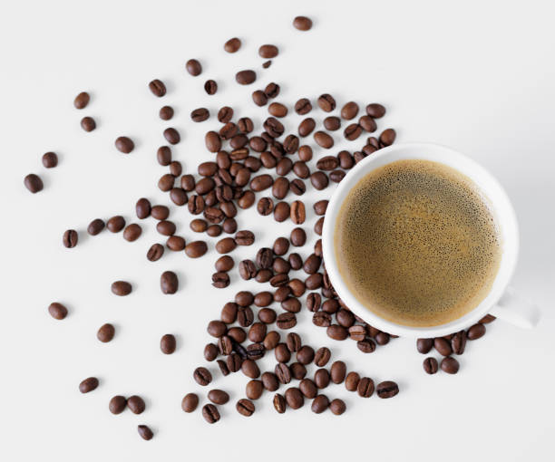 istock Top view of coffee cup and coffee beans on table 1731339095