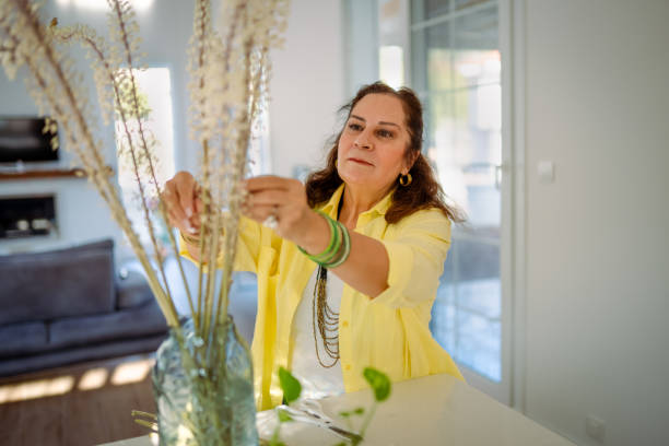 istock Senior Florist vlogging about plants at home 1731382205