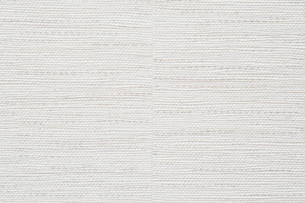 istock New light gray wallpaper with joining side by side two sheets with gap on wall. Closeup. Repair work of home. Front view. 1731422889