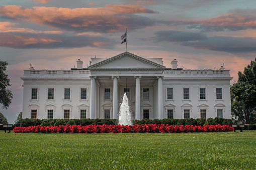 The White House with a perimeter fence.