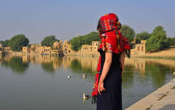 istock A young woman looking at the lake 1731450818