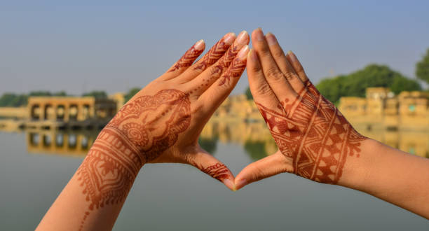 istock Henna tattoo on women hands 1731451067