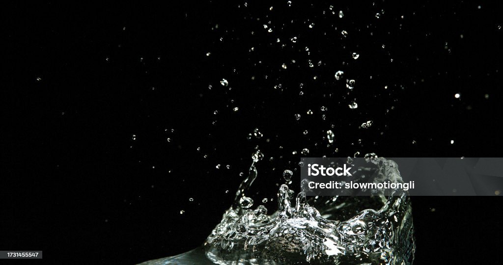 Exploding Water Background Water Exploding And Splashing Against Black Background Stock Photo ...