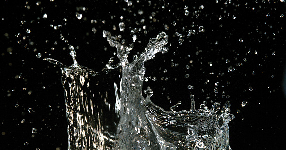 Water Exploding Upwards Effect Water Exploding And Splashing Against Black Background Stock Photo ...