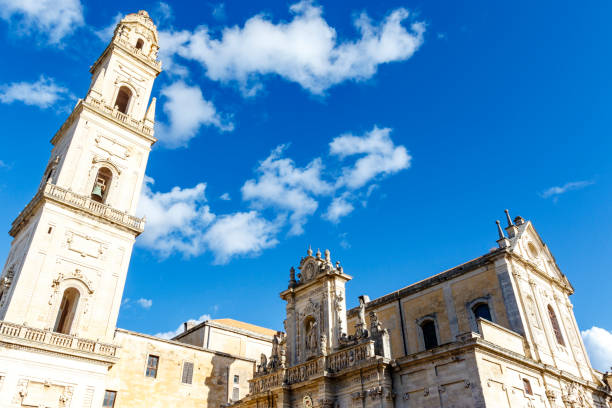 exterior of lecce cathedral and bell tower, lecce, apulia, italy - europe - baroque style lecce italy puglia imagens e fotografias de stock